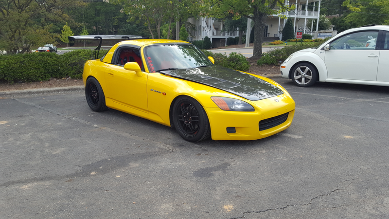 Wing as tall as the roof because race car bro